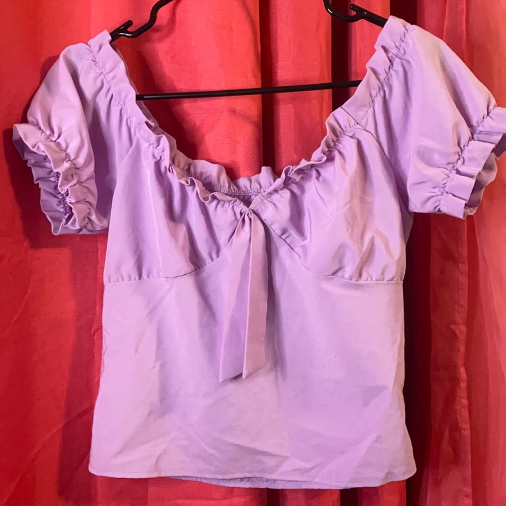 Lilac off shoulder shirt in good condition